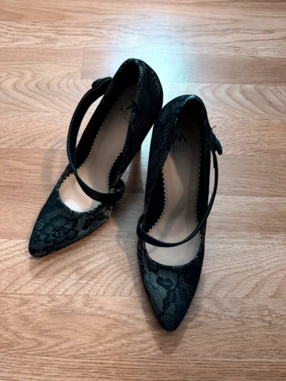 Black laced pointed heels